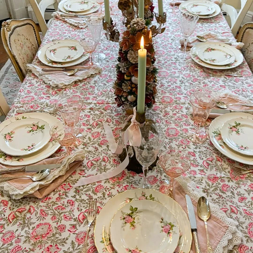 Large rectangular cotton tablecloth featuring hand block printed Pink and green floral country style pattern in Christmas table setting