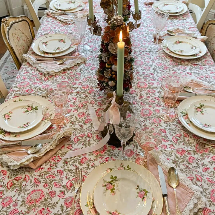 Large rectangular cotton tablecloth featuring hand block printed Pink and green floral country style pattern in Christmas table setting