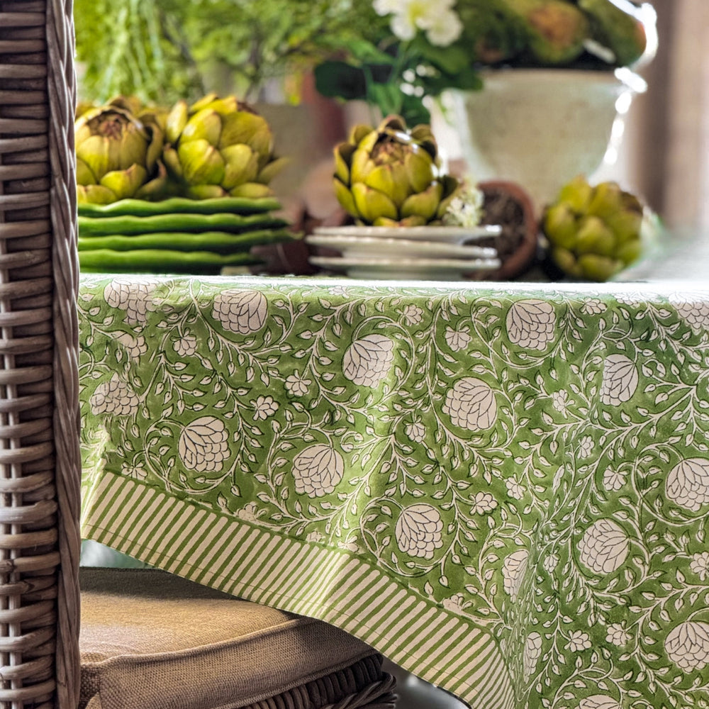 Green and white square tablecloth featuring a floral pattern, hand block printed on cotton. 