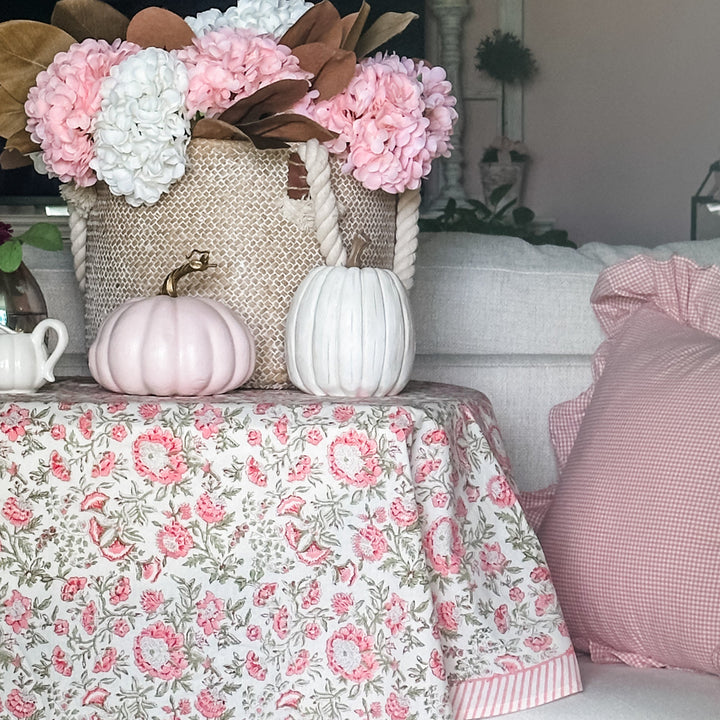 Pink Green block printed round tablecloth set up with pastel fall decor