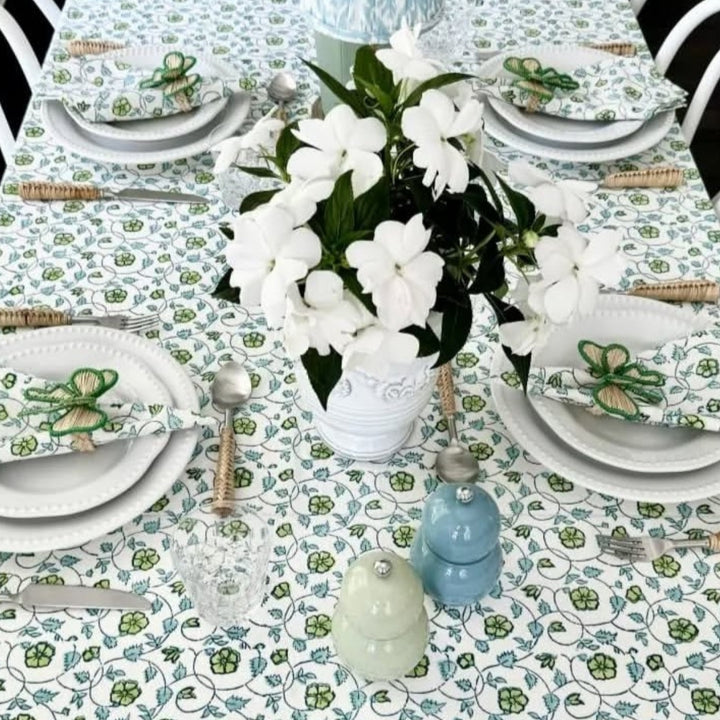Blue and Green hand block printed tablecloth set on a large square table for Christmas gathering