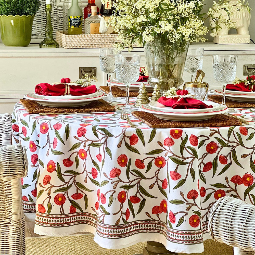 Hand block printed circular tablecloth featuring Australian native red gums floral pattern on cotton. 