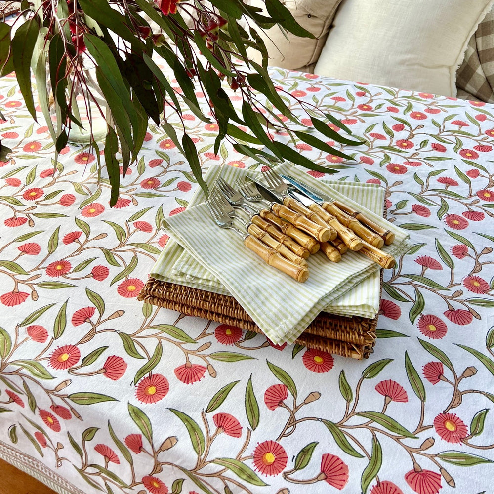Hand block printed rectangular tablecloth featuring Australian native red gums floral pattern on cotton. 